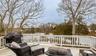Wooden deck with a grill