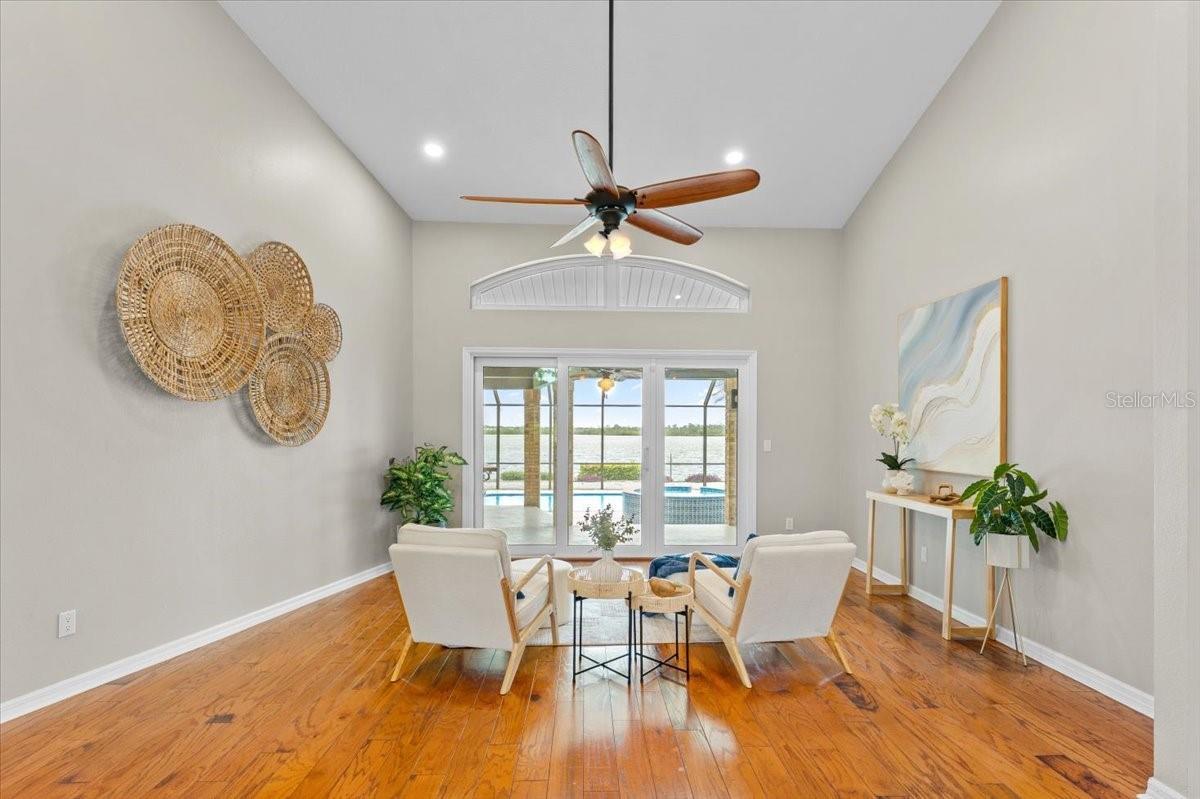 Living room with access to the pool