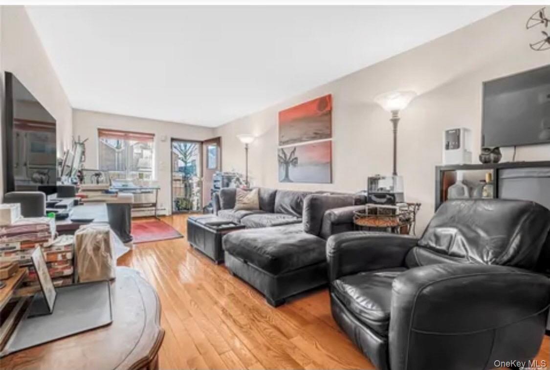Living room featuring light wood finished floors