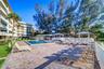 Pool deck offers loads of lounging options and is perfectly positioned to catch the seabreeze.