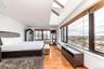 Master bedroom with huge windows overlooking Long Beach