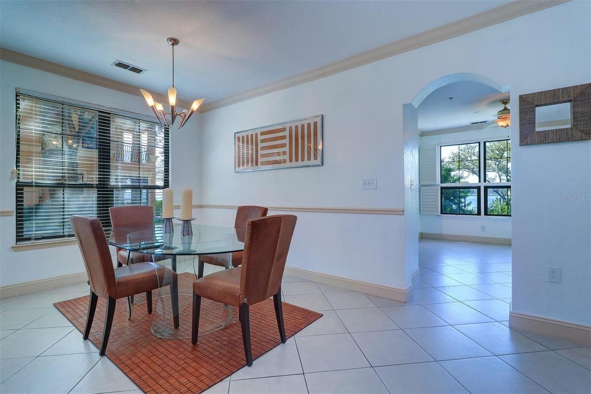 Dining room with kitchen entry on the right