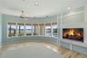 On the North side of the home, and across the pool from the Florida Room, you find the secluded waterfront Library/Office with Intracoastal Views