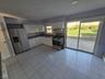 LARGE KITCHEN  TO BACK YARD