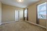 Bedroom 2 with a walk-in closet.