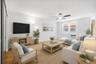 Refinished hardwood floors and fresh paint throughout Photo is virtually staged