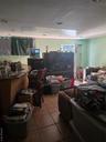 View of tiled living room