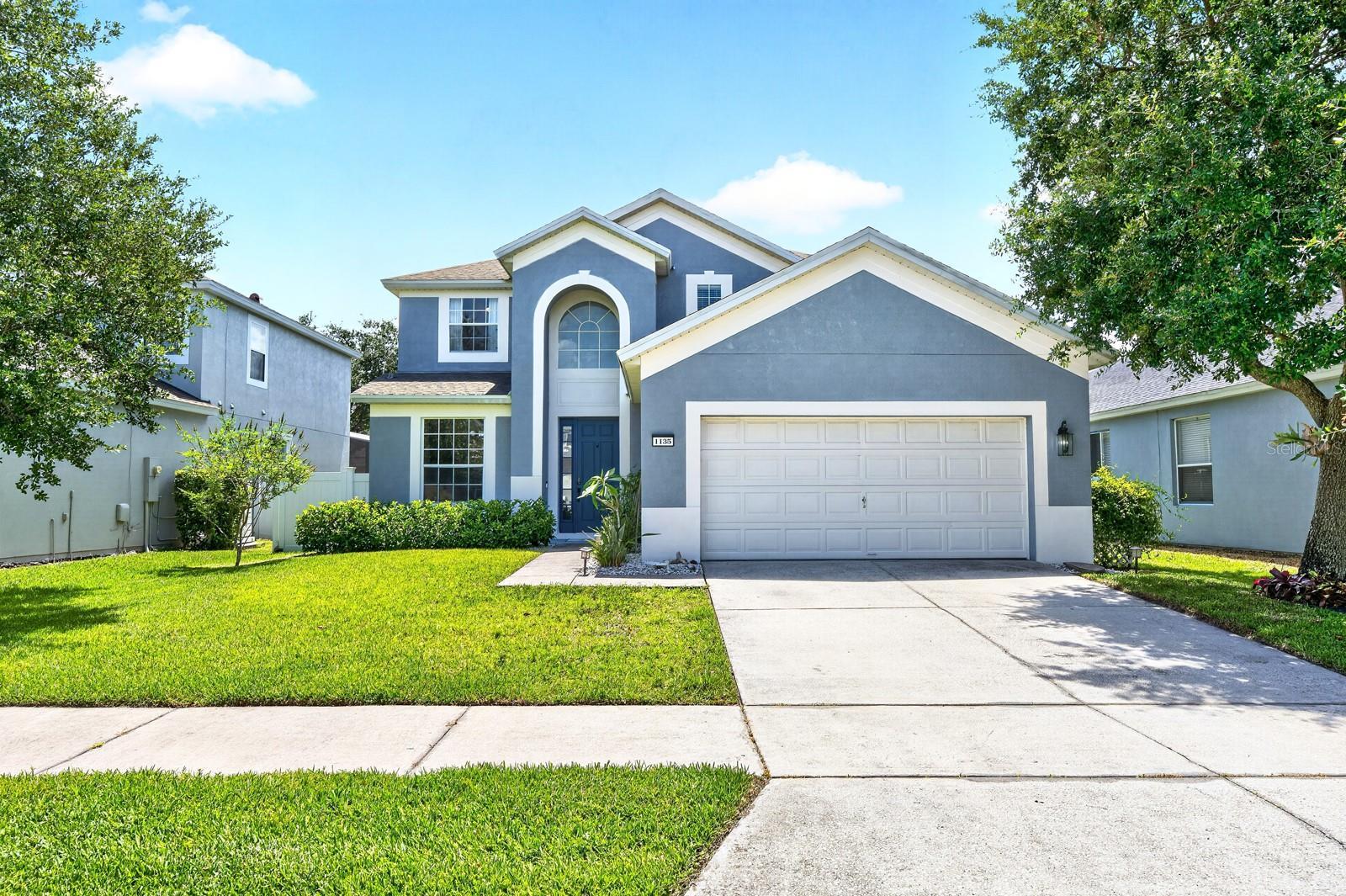 Room to grow, thoughtful UPDATES, and an incredible BACKYARD RETREAT make this spacious two-story home in the sought-after GUARD GATED COMMUNITY of Sp