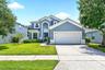 Room to grow, thoughtful UPDATES, and an incredible BACKYARD RETREAT make this spacious two-story home in the sought-after GUARD GATED COMMUNITY of Sp