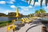 Resort style community clubhouse with a community pool, fitness center and lake front pool.