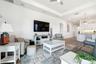 Take in the view back toward the entry and hall—spacious, bright, and beautifully designed!