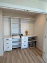 Large Primary Closet, organized.