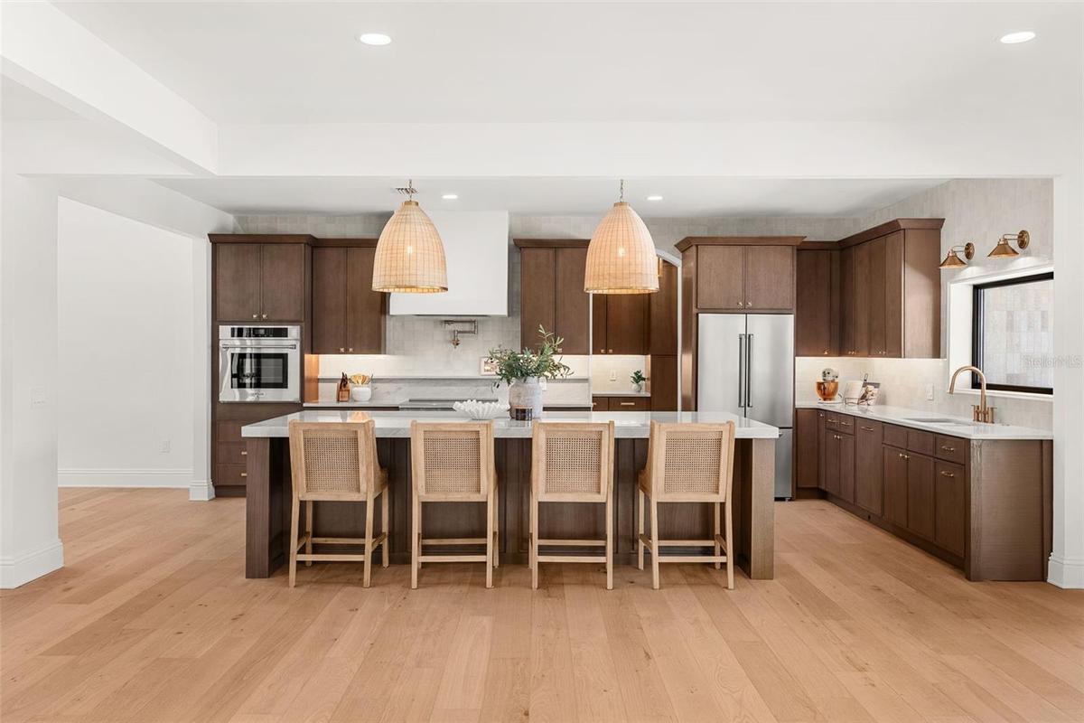 LUXURIOUS CHEF'S KITCHEN SHOWCASING HIGH-END APPLIANCES AND EXCEPTIONAL DESIGN