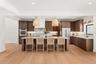 LUXURIOUS CHEF'S KITCHEN SHOWCASING HIGH-END APPLIANCES AND EXCEPTIONAL DESIGN