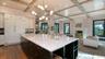 Expansive island anchors gourmet kitchen