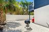 Left side yard for BBQ and entertaining