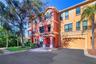 Front view of the townhome with garage