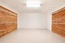 cedar walls of storage closet inside garage
