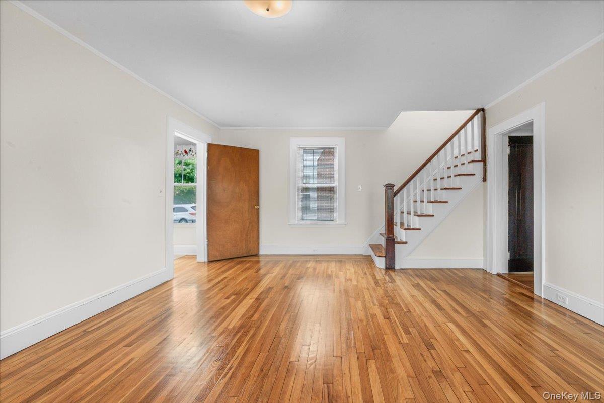 Spacious Living Room with original details and original staircase