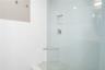 Full Bath 2 Seamless Glass Shower and fine tile work.