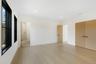 Unfurnished bedroom featuring light wood-type flooring, recessed lighting, and connected bathroom