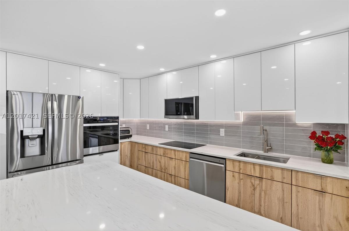 Gorgeous new kitchen cabinets and appliances for great meal prep and entertaining