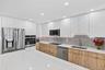 Gorgeous new kitchen cabinets and appliances for great meal prep and entertaining