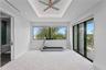 3rd level bedroom/flex space, bifold-slider facing west