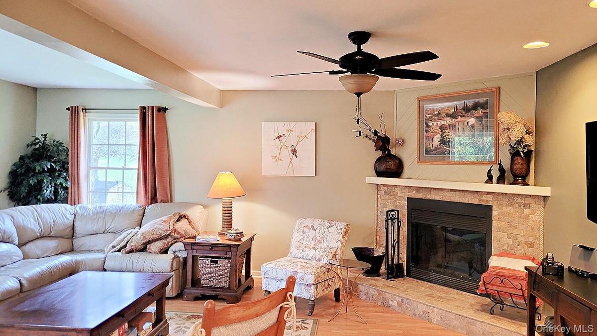 Wood-burning fireplace in the two-bedroom unit living room.