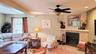Wood-burning fireplace in the two-bedroom unit living room.