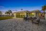 Sliding glass doors from living room and primary suite