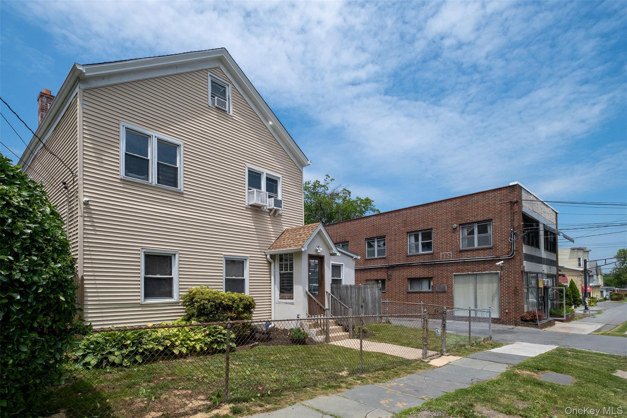 This is a rare compound in lower westchester with a residential duplex, a commercial building and 5 garage bays with a large parking area.