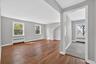 Unit #2-Spacious living area with view into the kitchen.
