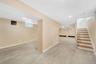 Full finished basement with separate  side entrance.