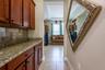 Butler's Area/Dry Bar which leads into the family room or dining area.