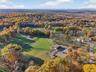 Aerial view of property and surrounding area with rural landscape