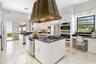 The eat-in kitchen is on the North West corner of the home and has stunning views.