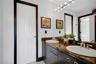 A Jack-and-Jill bathroom sits between bedrooms three and four.