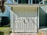 Attached storage closet - added on by seller