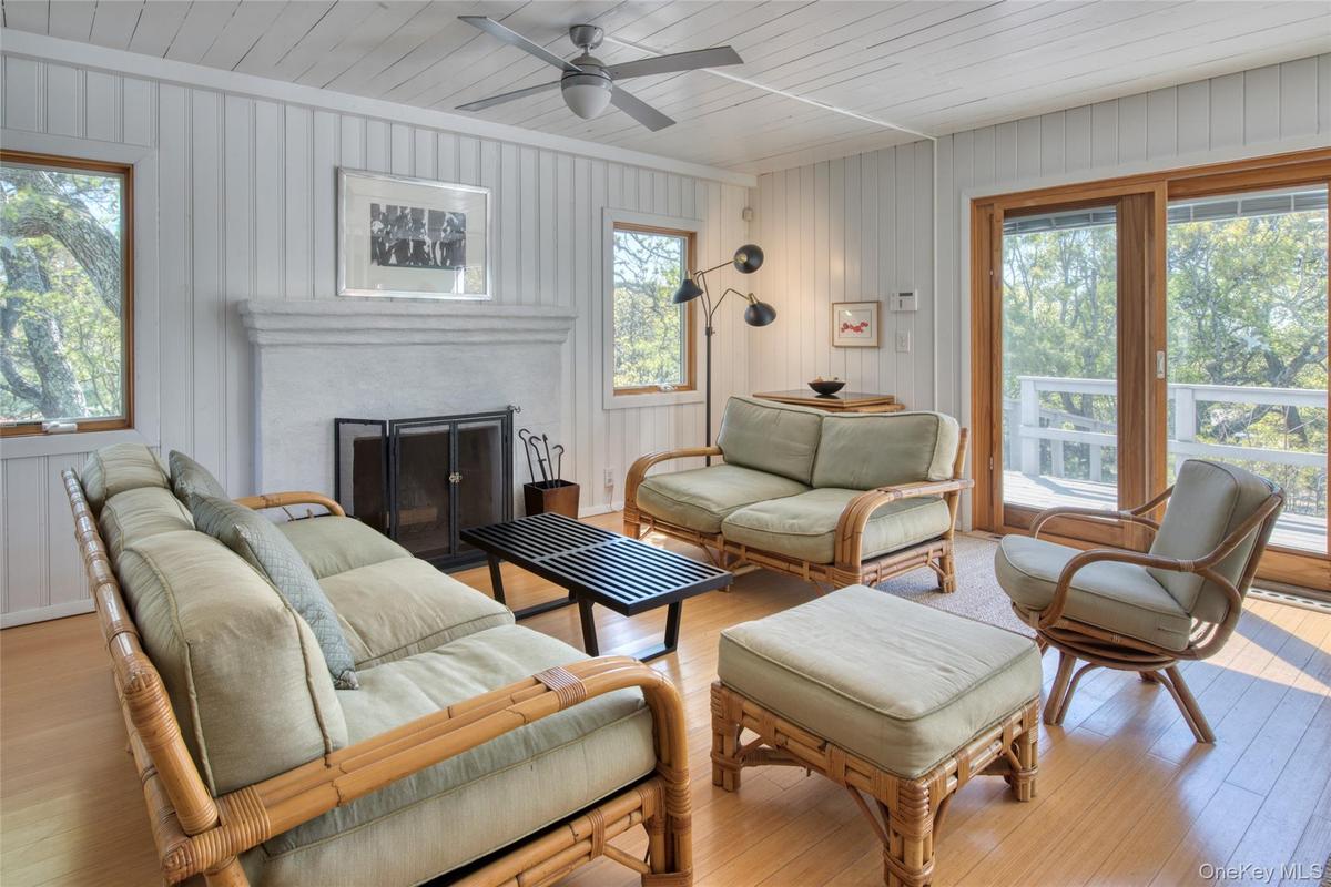 Living room with wood burning fireplace