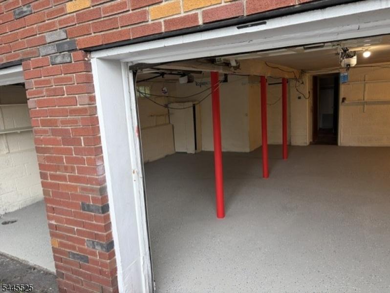two oversized car garages