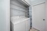 Full sized washer and dryer in each unit.