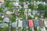 Aerial perspective showcasing a residential neighborhood with a consistent street grid