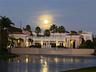 Dusk overlooking the clubhouse and pool area.