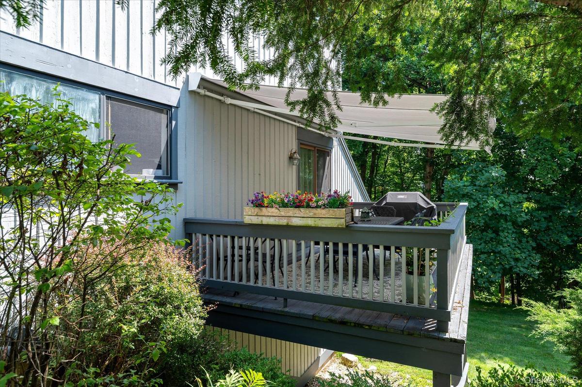 Main level deck with retractable awning