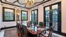Formal dining room with ornate coffered ceiling