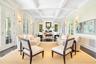 Sunroom featuring french doors, beam ceiling, and coffered ceiling