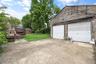 Detached Garage – Detached two-car garage featuring a spacious private driveway with ample off-street parking and additional storage. Conveniently loc