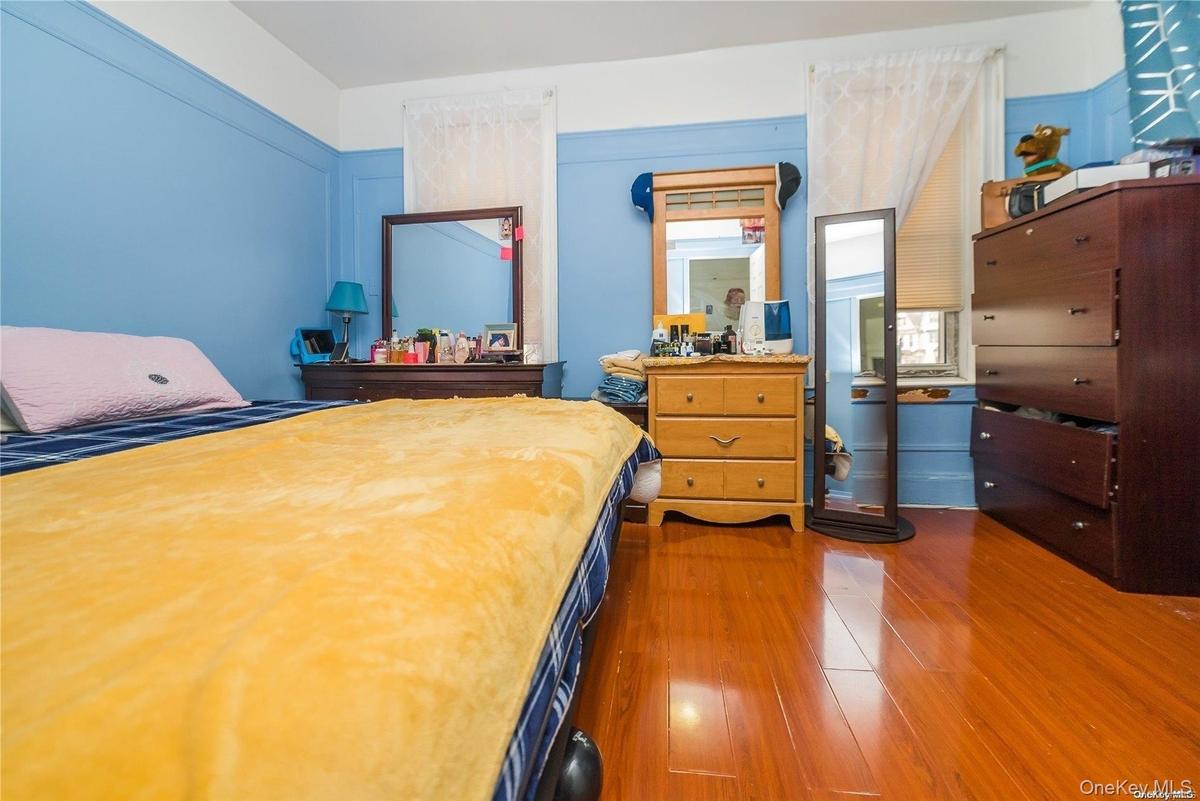 Bedroom featuring wood finished floors