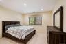 Carpeted room featuring recessed lighting, a window with blinds, and light-colored walls